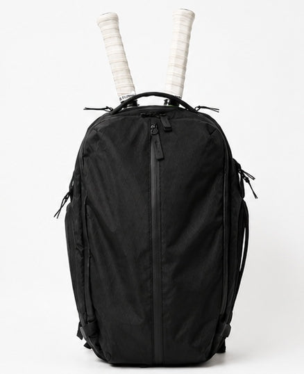 SOL 01 black backpack with two tennis rackets